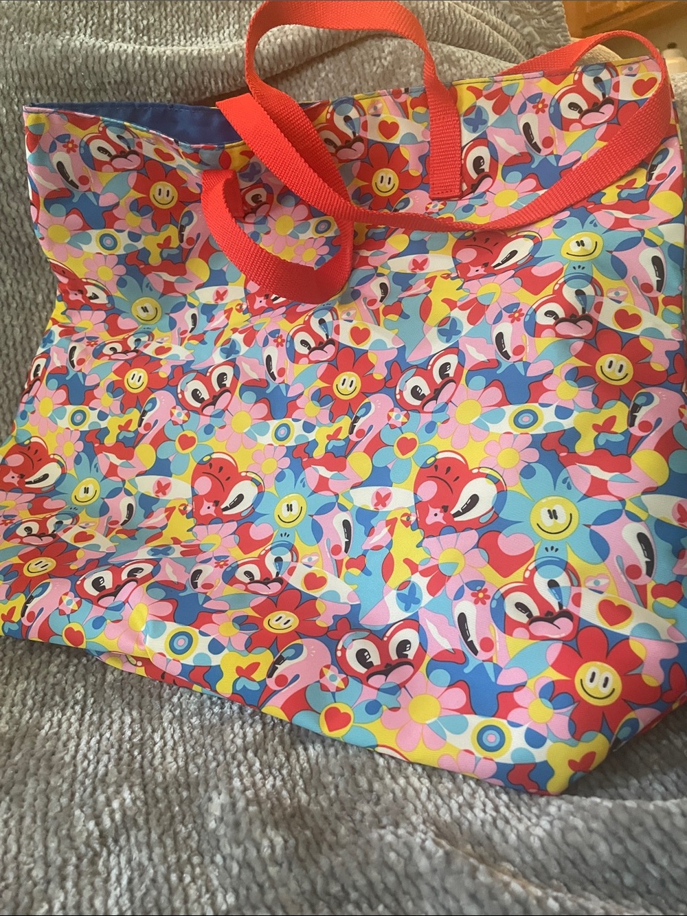 Estee Lauder Multicolor Floral & Smiley Print Tote with Red Handles
